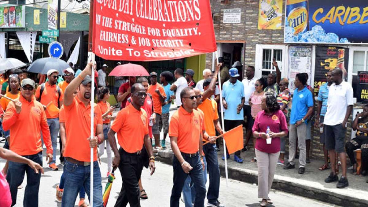 Gedenken Sie am Tag der Arbeit in Trinidad und Tobago den historischen Butler-Ölfeld-Unruhen von 1937 und der daraus resultierenden Verbesserung der Arbeitsbedingungen.